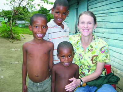 Barbara Bullock with Dominican/Haitian children on border. 