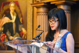 Photo of Geraldine Heng speaking before an audience at Arizona State University.