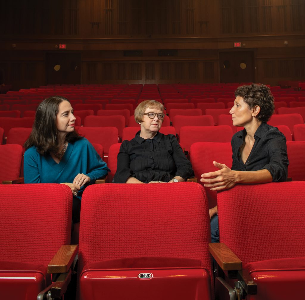 Donna Kornhaber, Sabine Hake and Paola Bonifazio sitting in a movie theater.