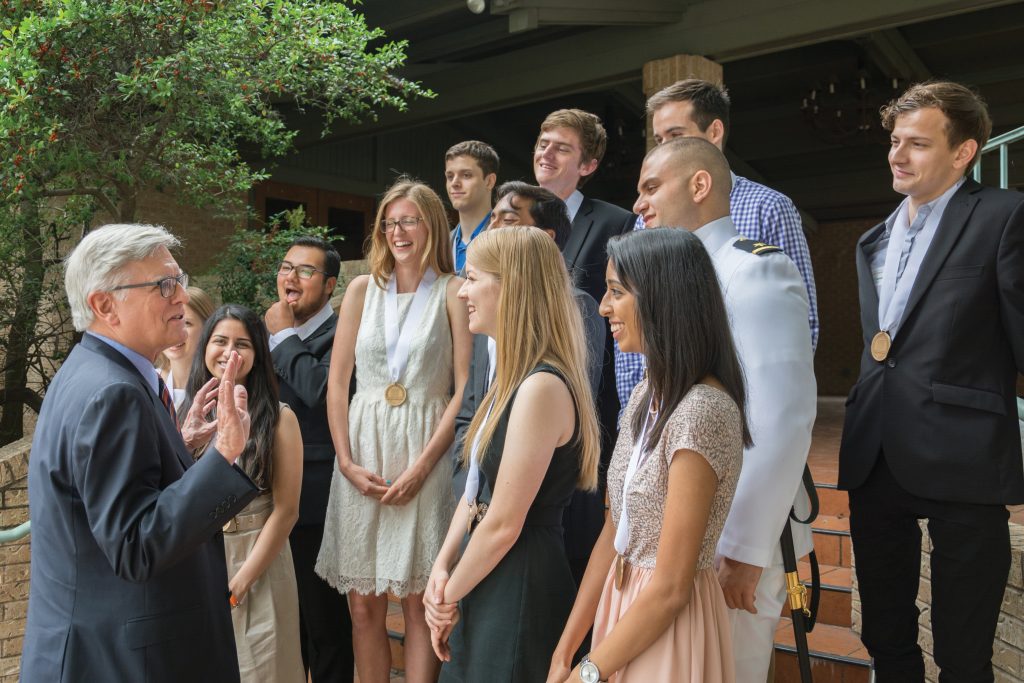 Randy Diehl visits with graduating seniors who were honored as Dean’s Distinguished Graduates in May 2015.