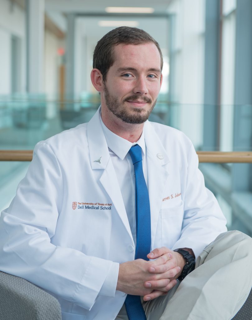 Philosophy alumnus Garrett Johnson in the Dell Medical School’s Health Learning Building.