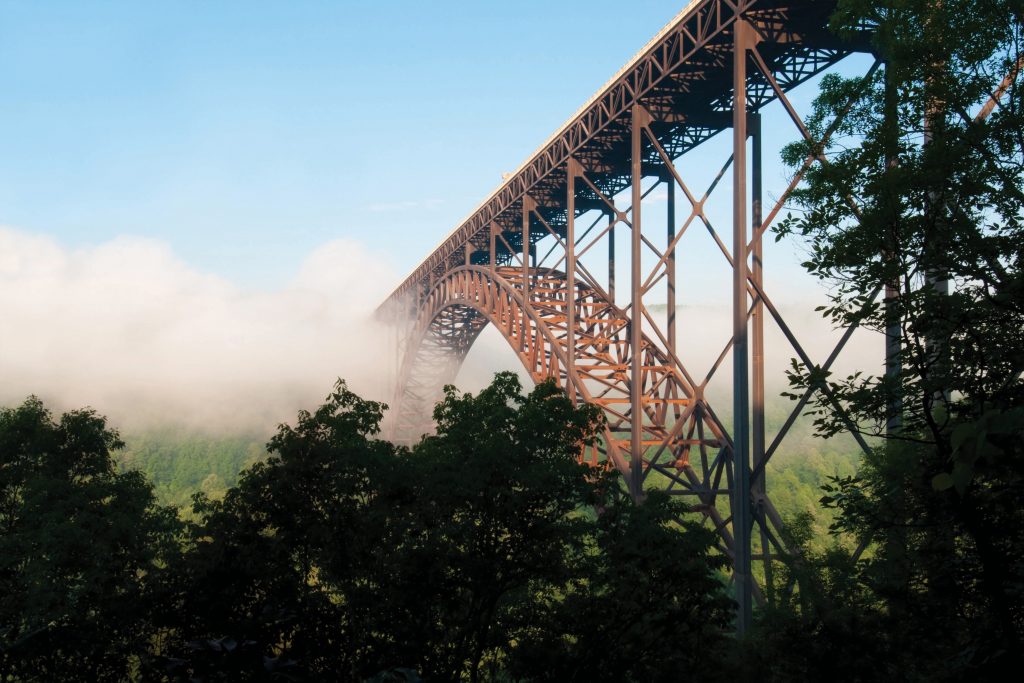 New River Gorge Bridge located in Fayetteville, West Virginia extends 3,030 ft. across. When it opened in 1977, it was the highest vehicular bridge in the world. It is currently the third highest bridge in the United States and the fourth longest arch bridge in the world. Photo by Shutterstock.