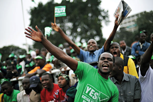 Kenyan voters celebrate passage of a new constitution
