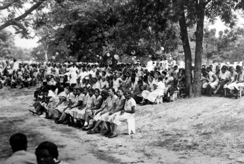 May Day festival, circa mid-1950s; patients listen to a musical performance.