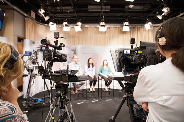 Students from UT's Senate of College Councils at Voice of America taping in a LAITS studio