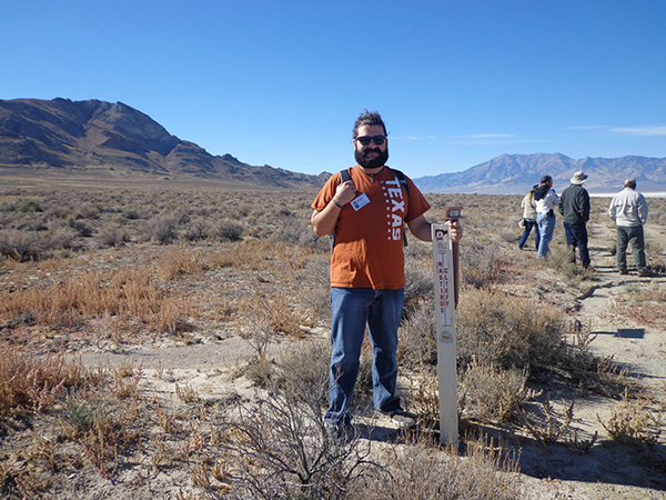 Garza at one of the Hastings Cutoff Trail Markers. On the right is Pilot Peak, where the Donner-Reed Party finally found a spring after miles of crossing the salt flats without water.