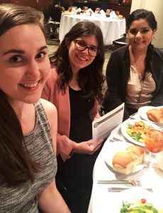 Emily Rohles (left) and other members of Women in Foreign Affairs attend the dining workshop.
