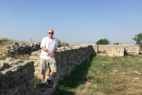 Orr stands amongst Histria ruins in Romania.