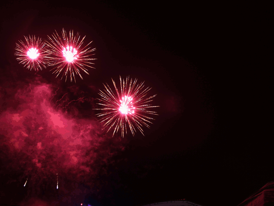 red fireworks in a dark sky