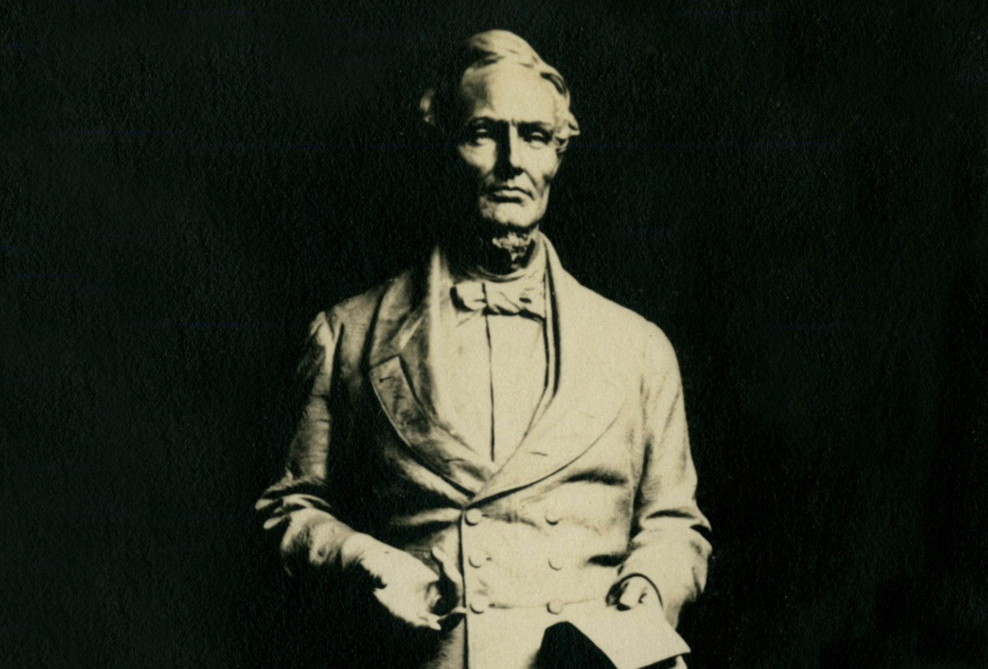 Black and white photograph of the Jefferson Davis statue in sculptor Pompeo Coppini's studio.