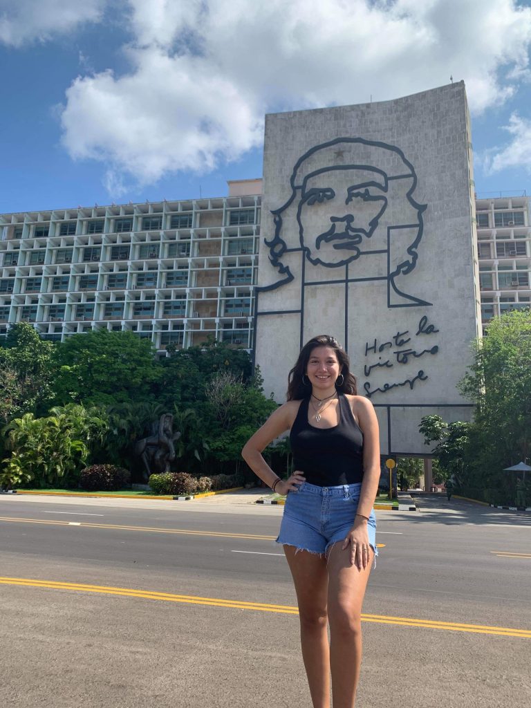 Rodriguez stands in front of a sculpture of Che Guevara in Plaza de la Revolución. 